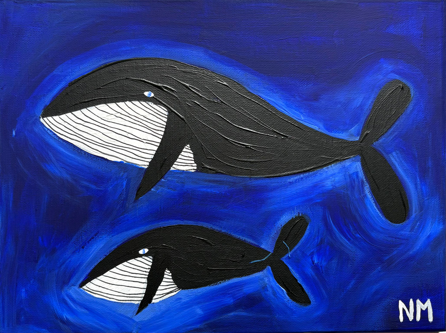 Whales in the blue.