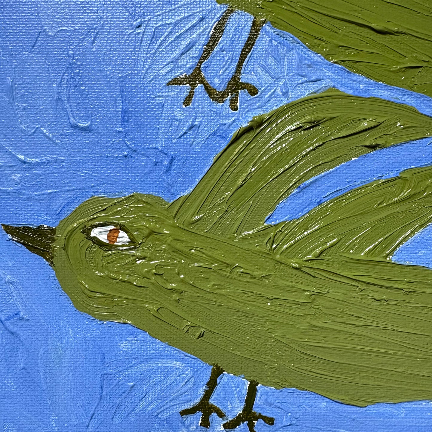 Three green birds.