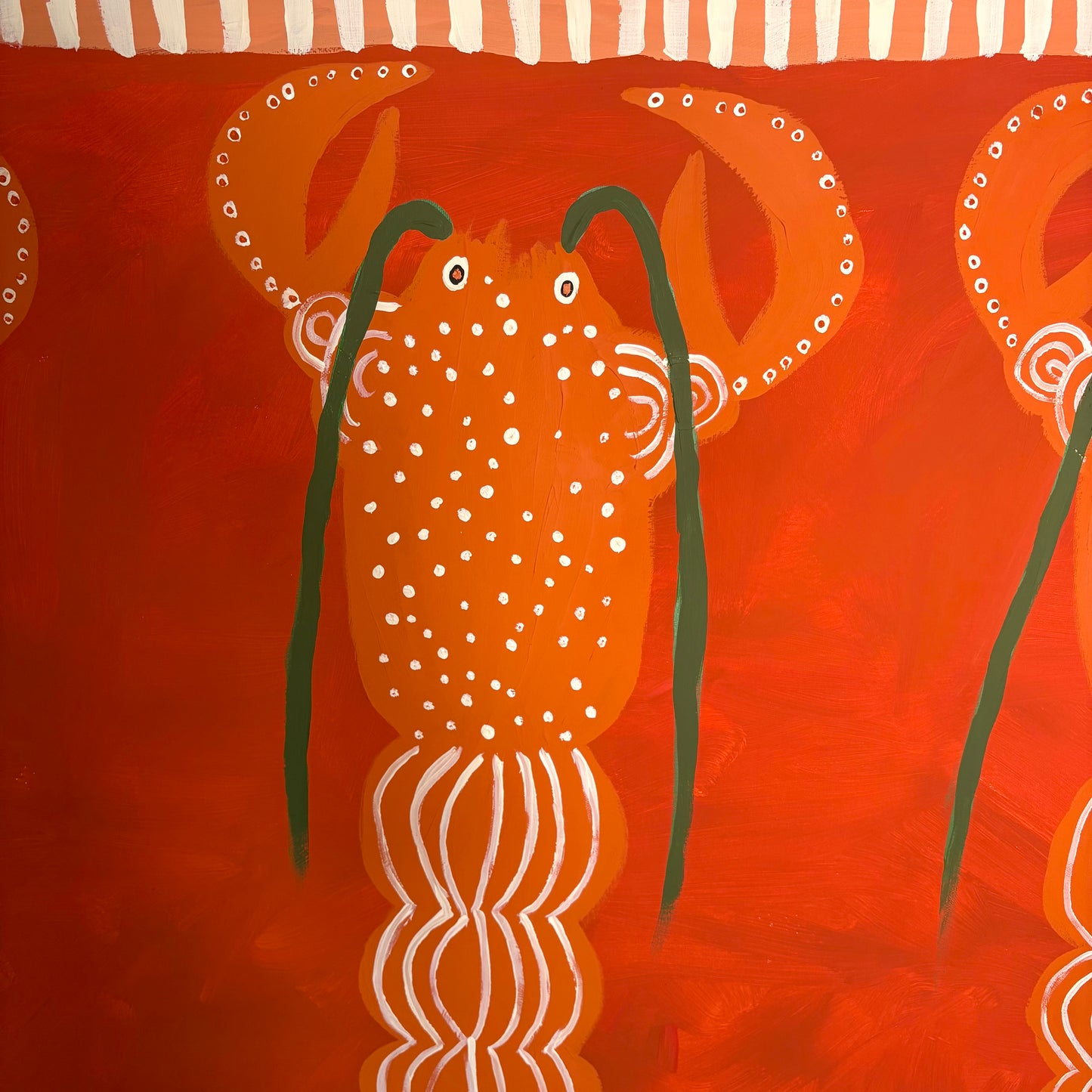 Three orange lobsters.