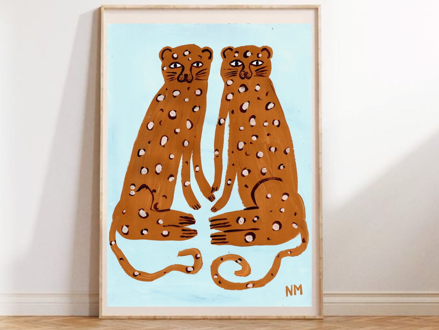 Two leopards on blue print.