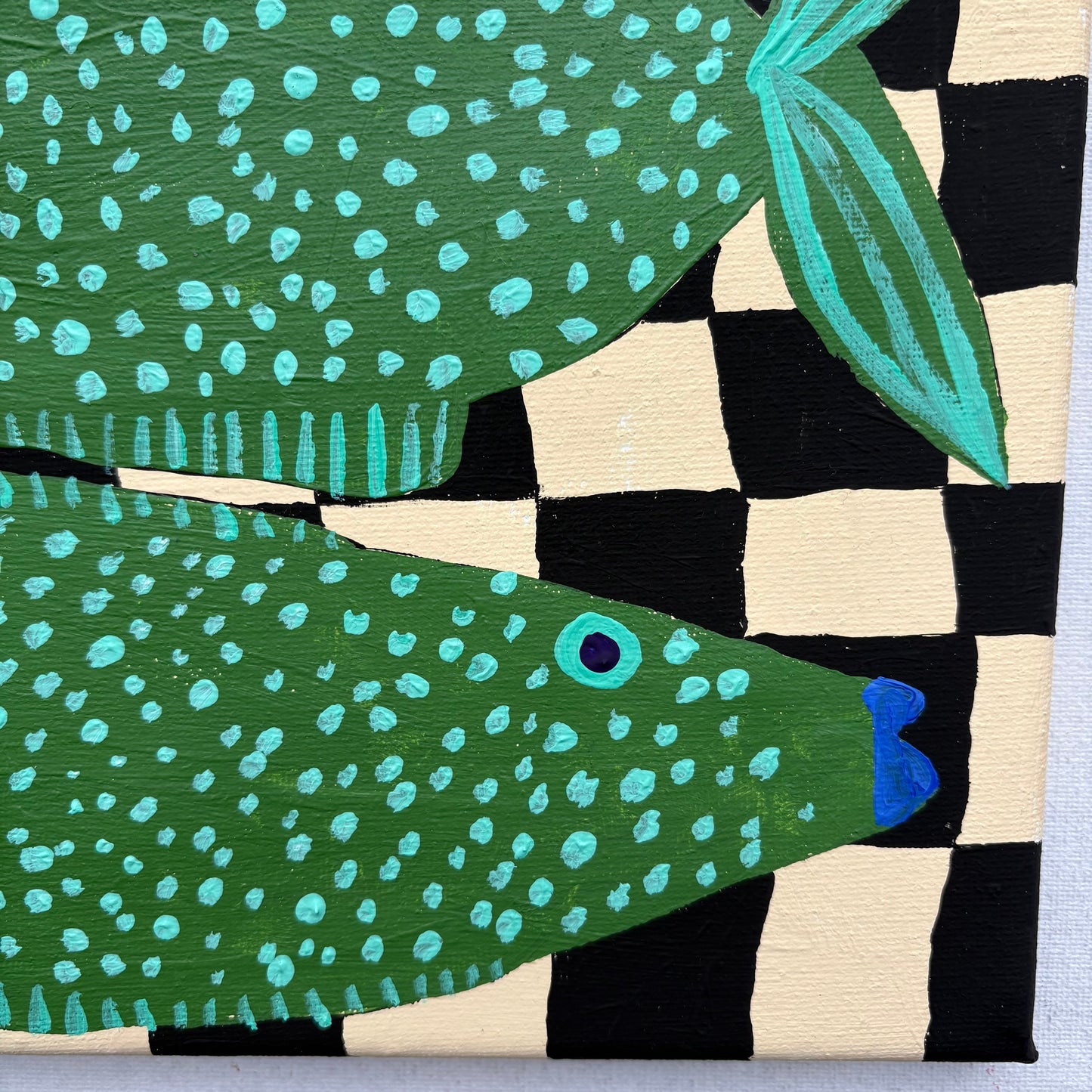 Green spotty fish.