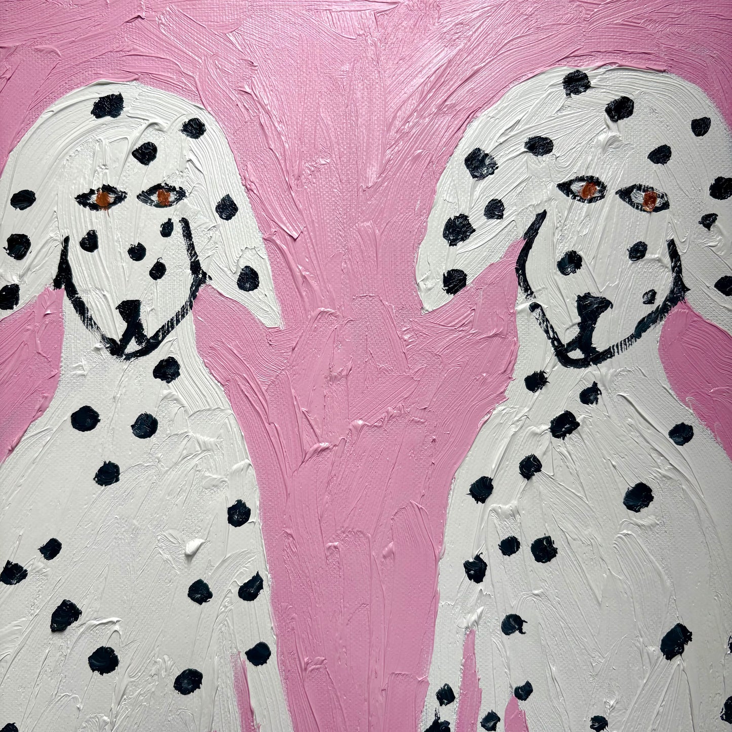 Dalmatians on pink.