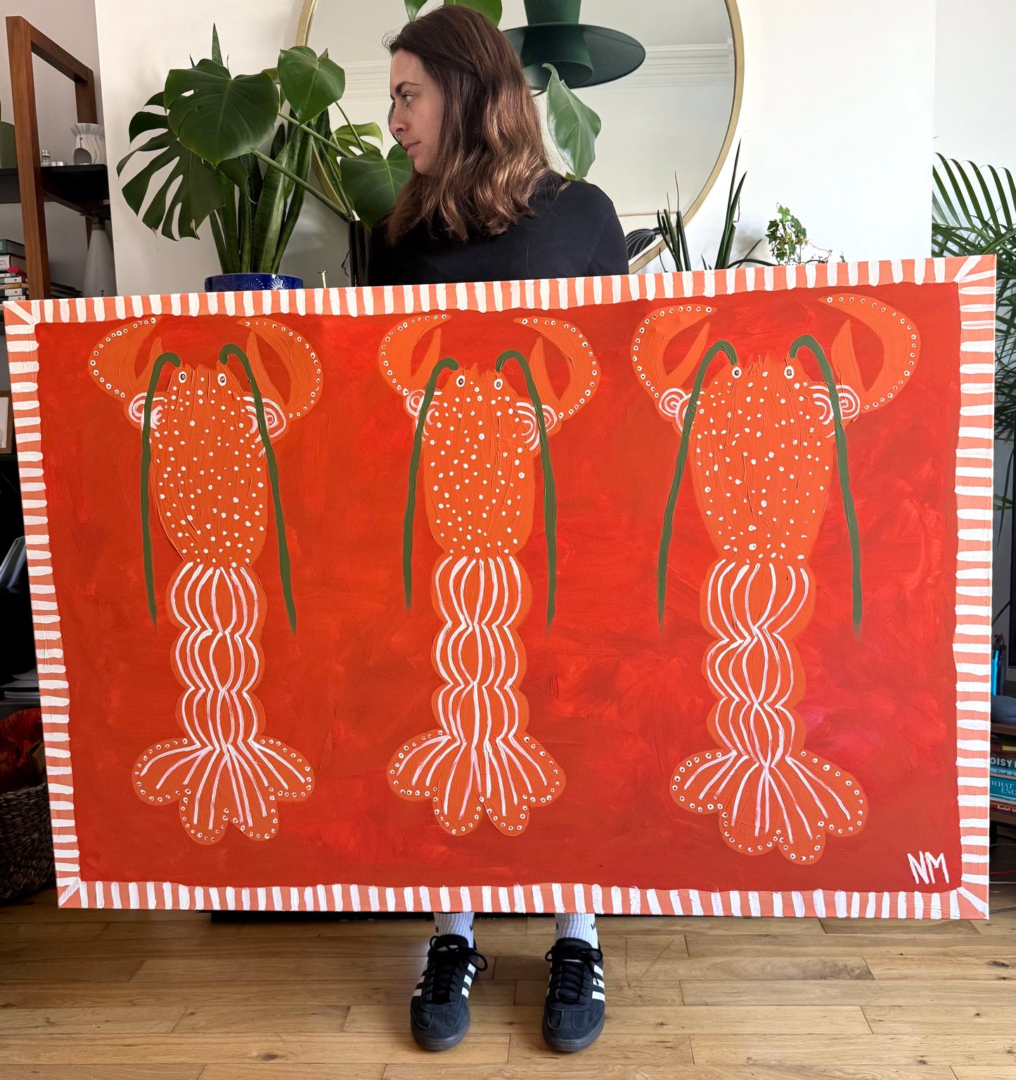 Three orange lobsters.