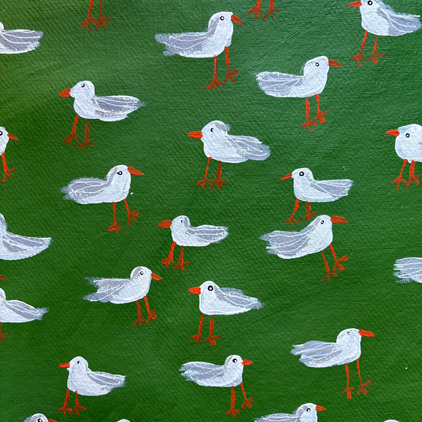 Seagulls on green.