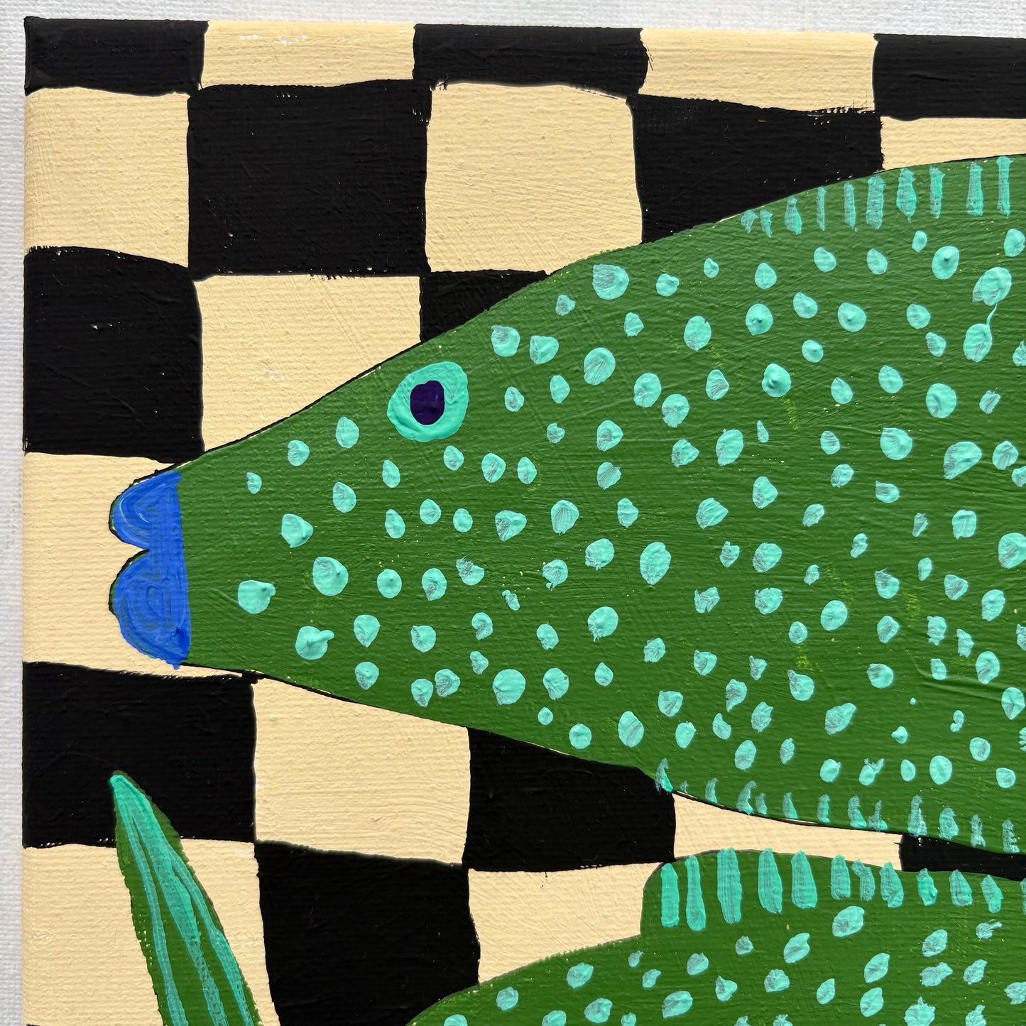 Green spotty fish.