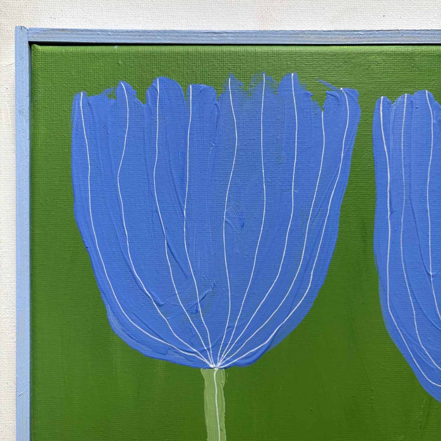 Two blue flowers.