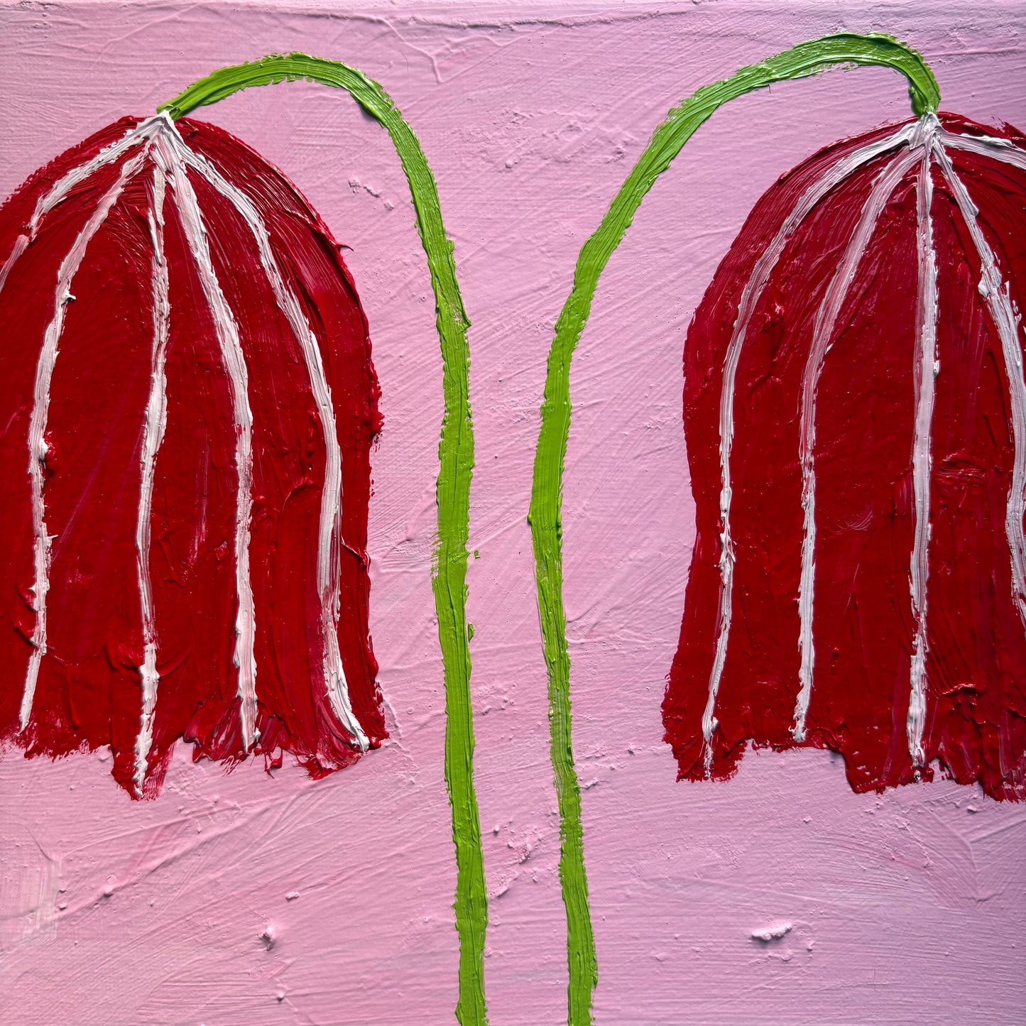 Two red flowers.