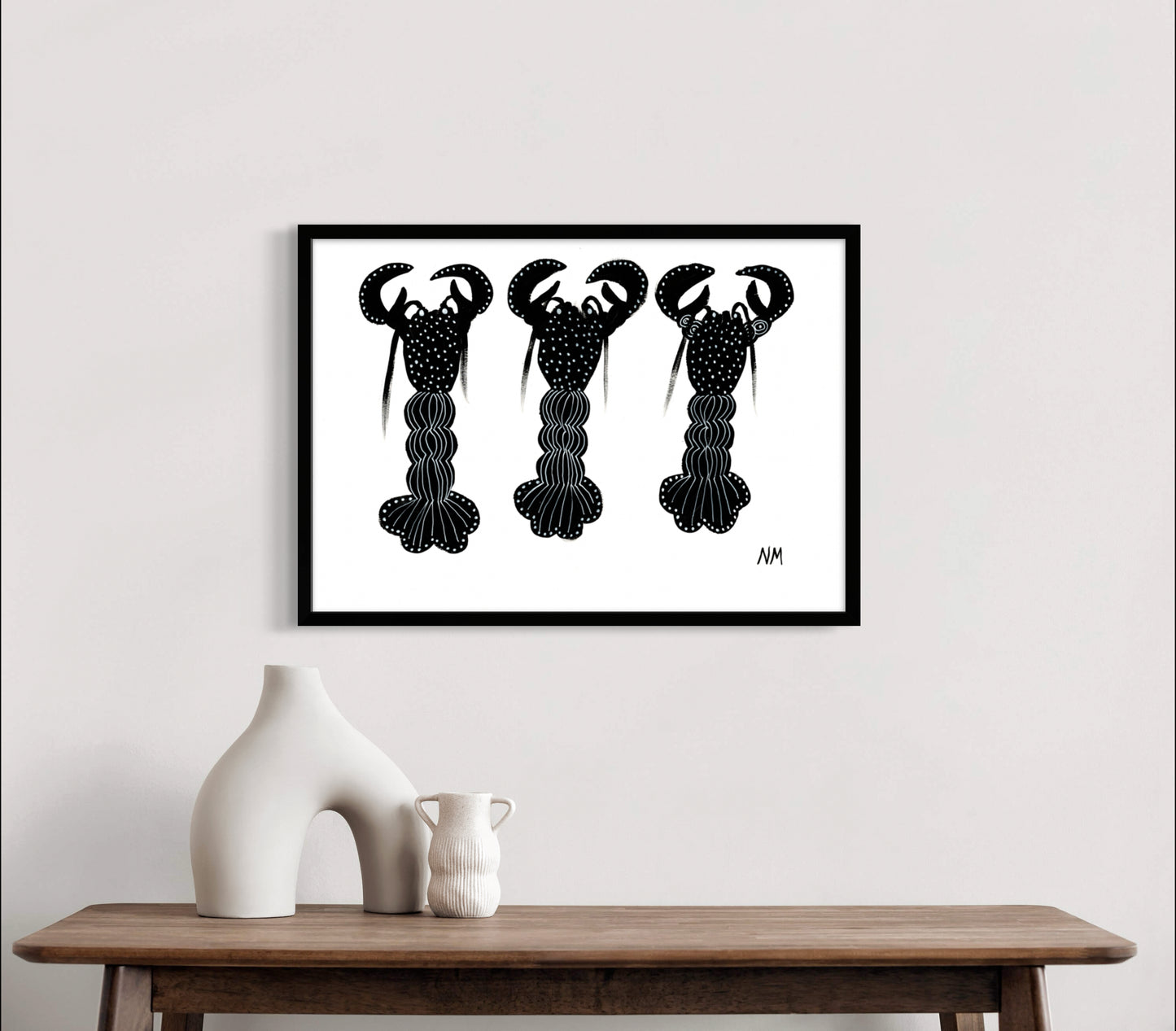 Three black lobsters