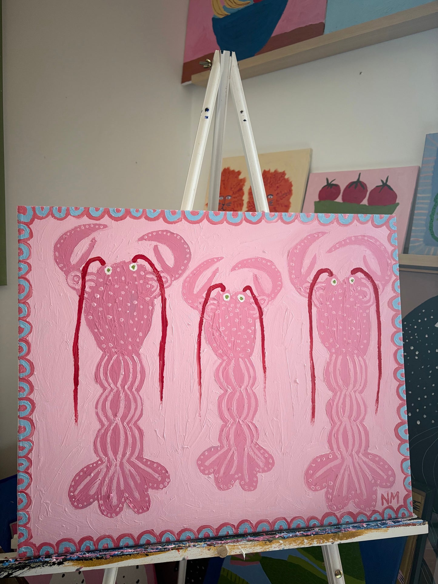 Three pink lobsters.