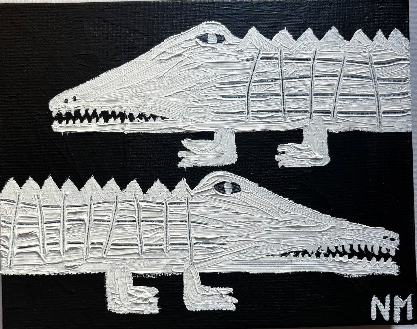 Two white crocs.