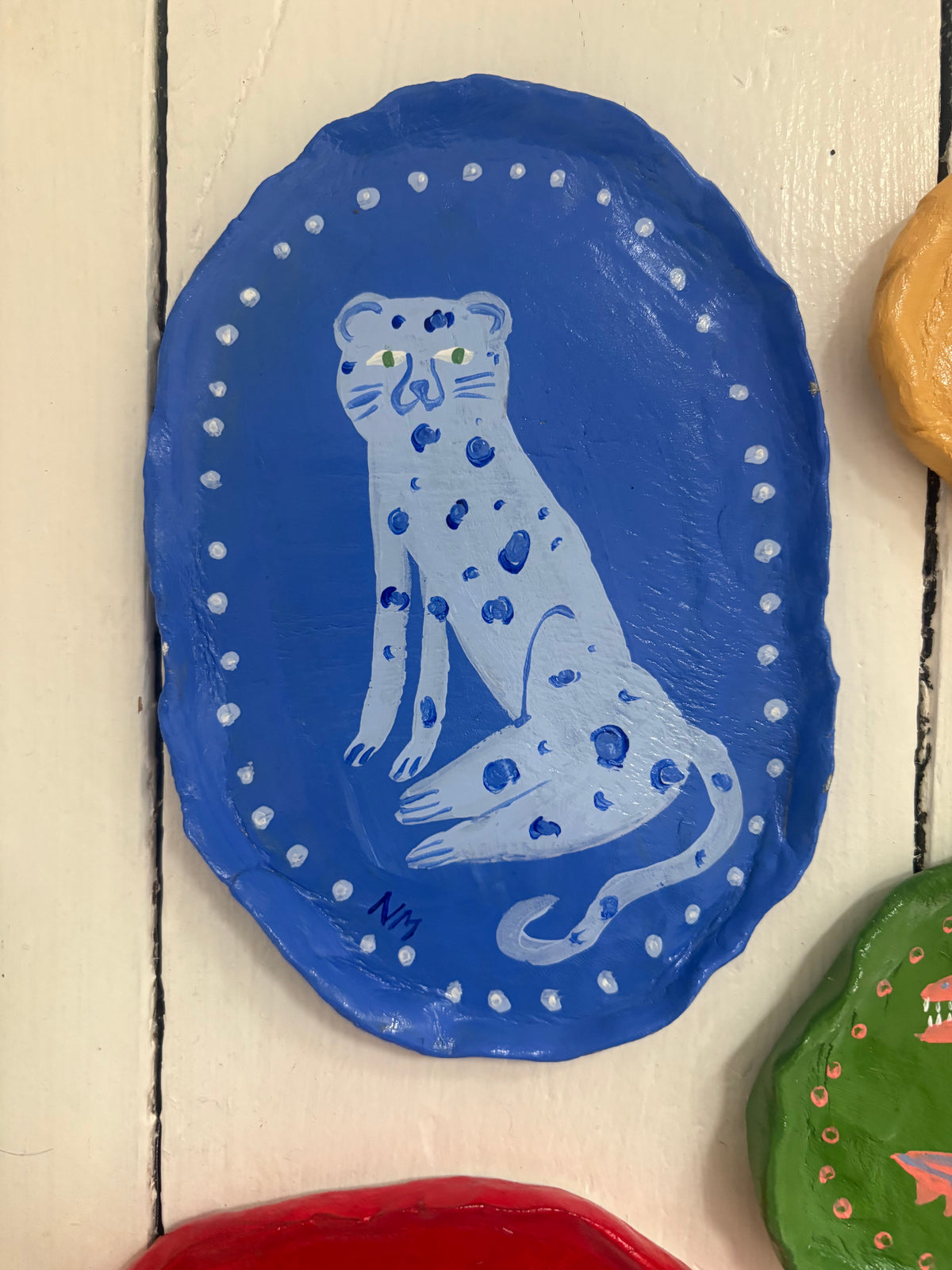 Blue leopard wall plate.