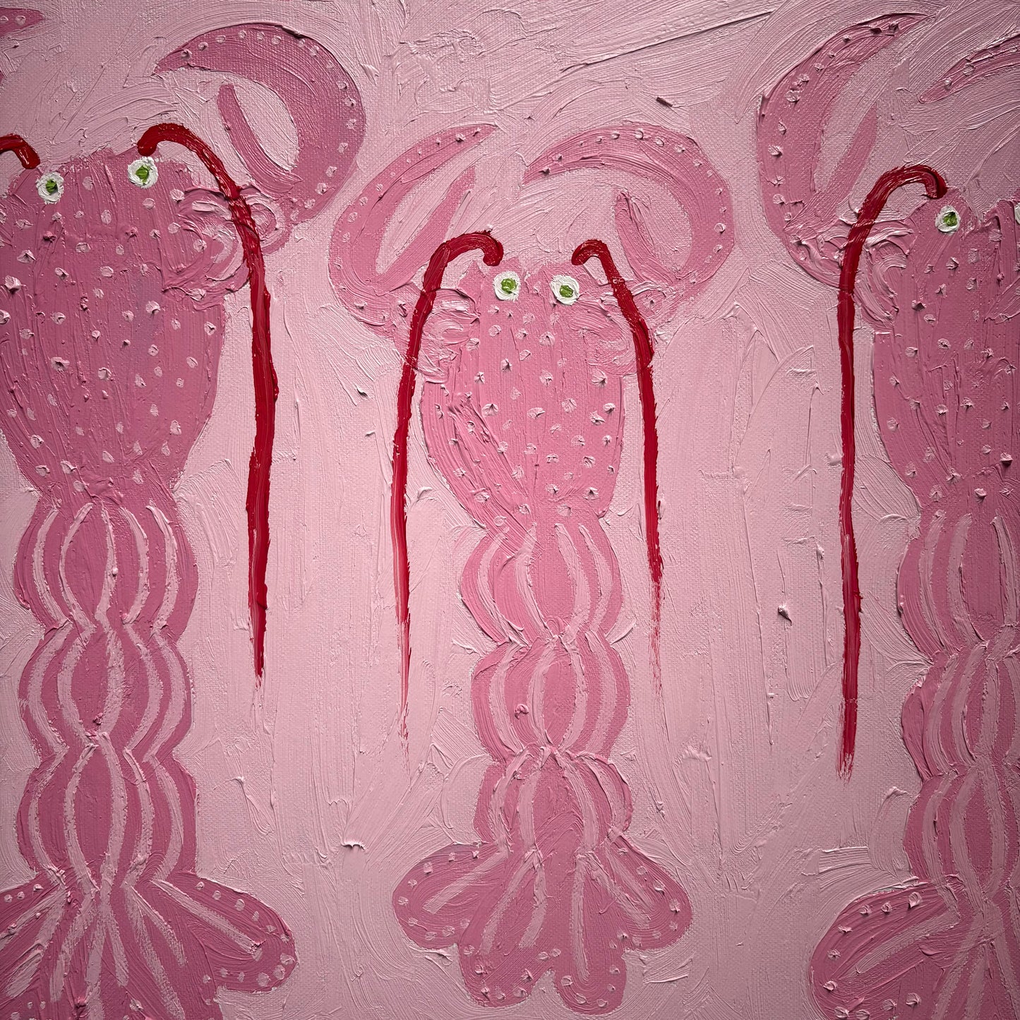 Three pink lobsters.