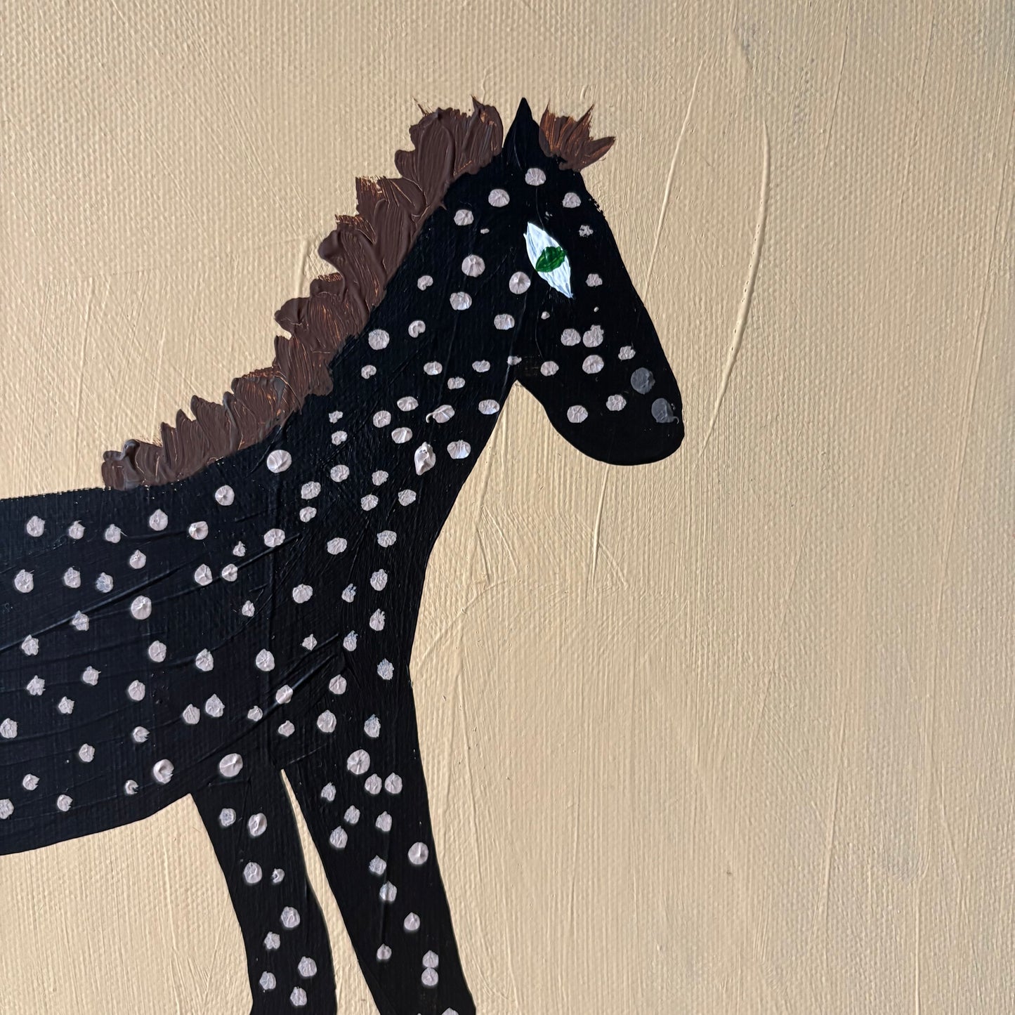 Two spotty horses.