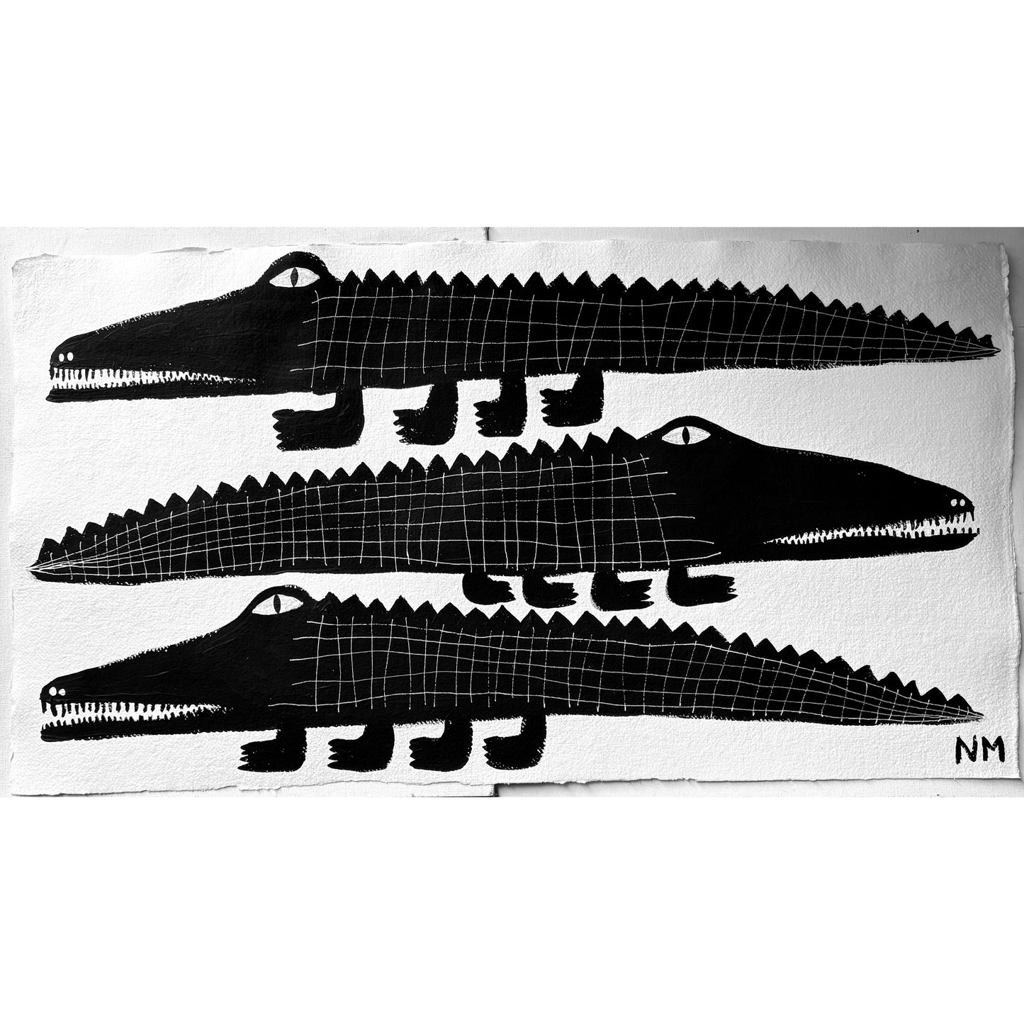 Three black crocodiles.
