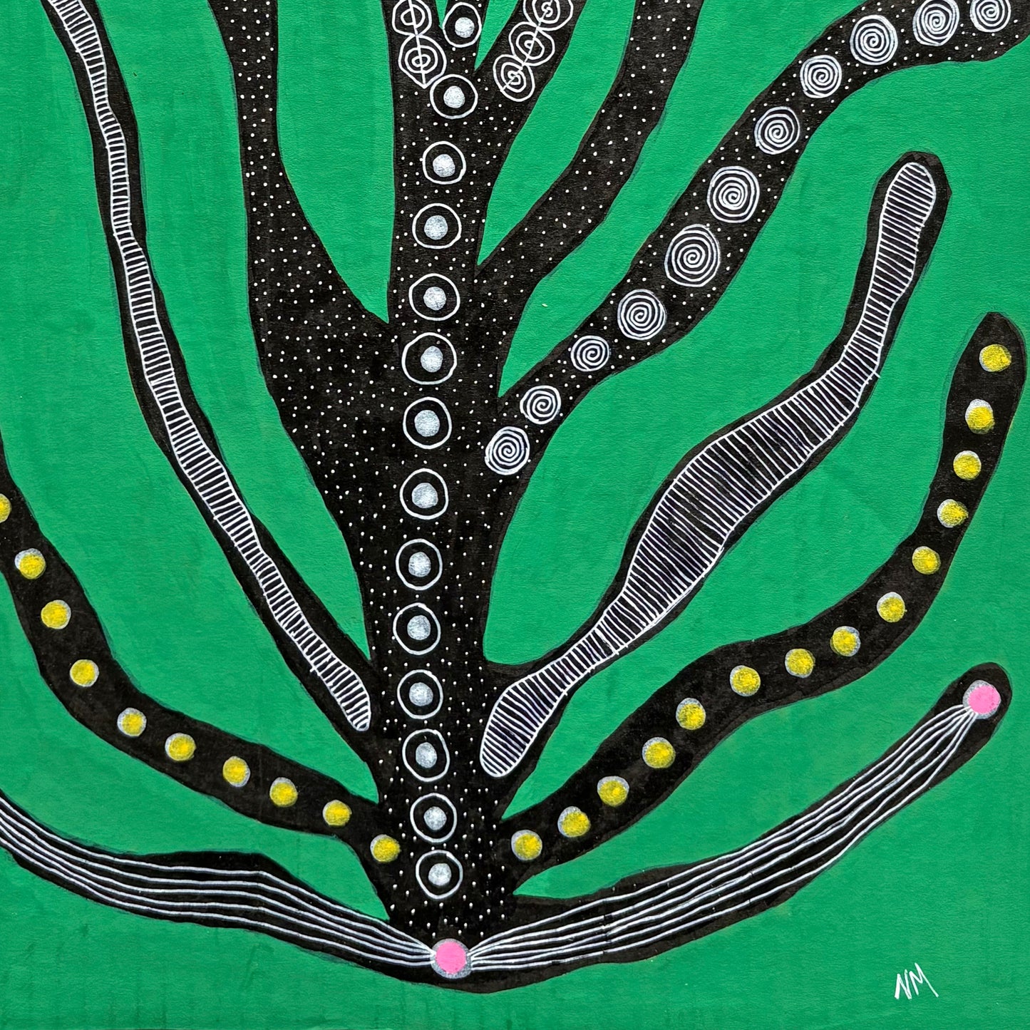 Black flower on green.