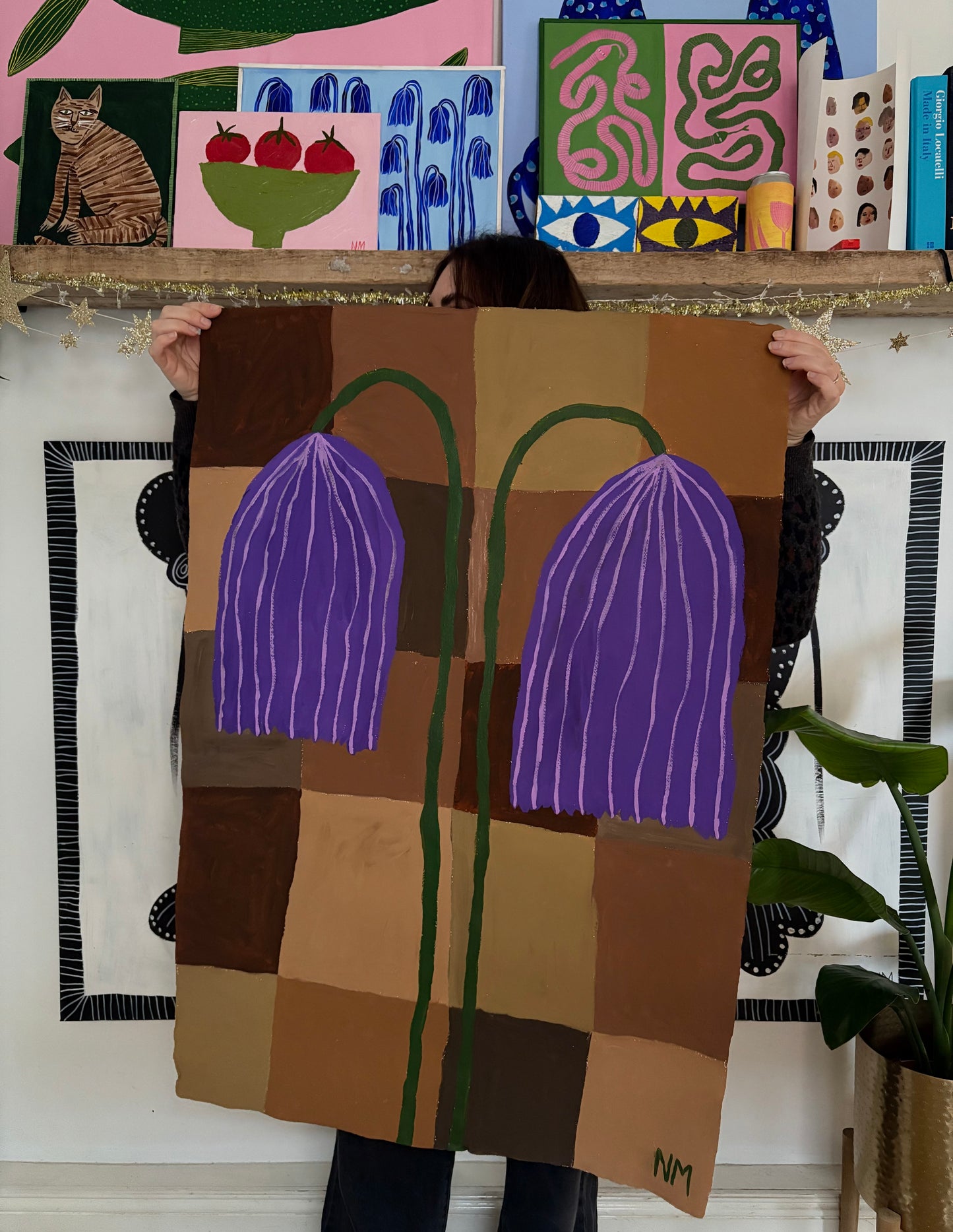 Two purple flowers.