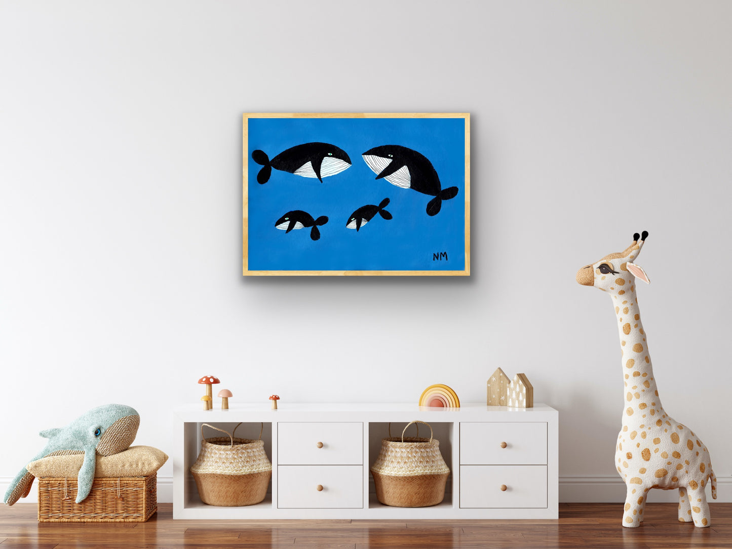 Whale family on blue print.