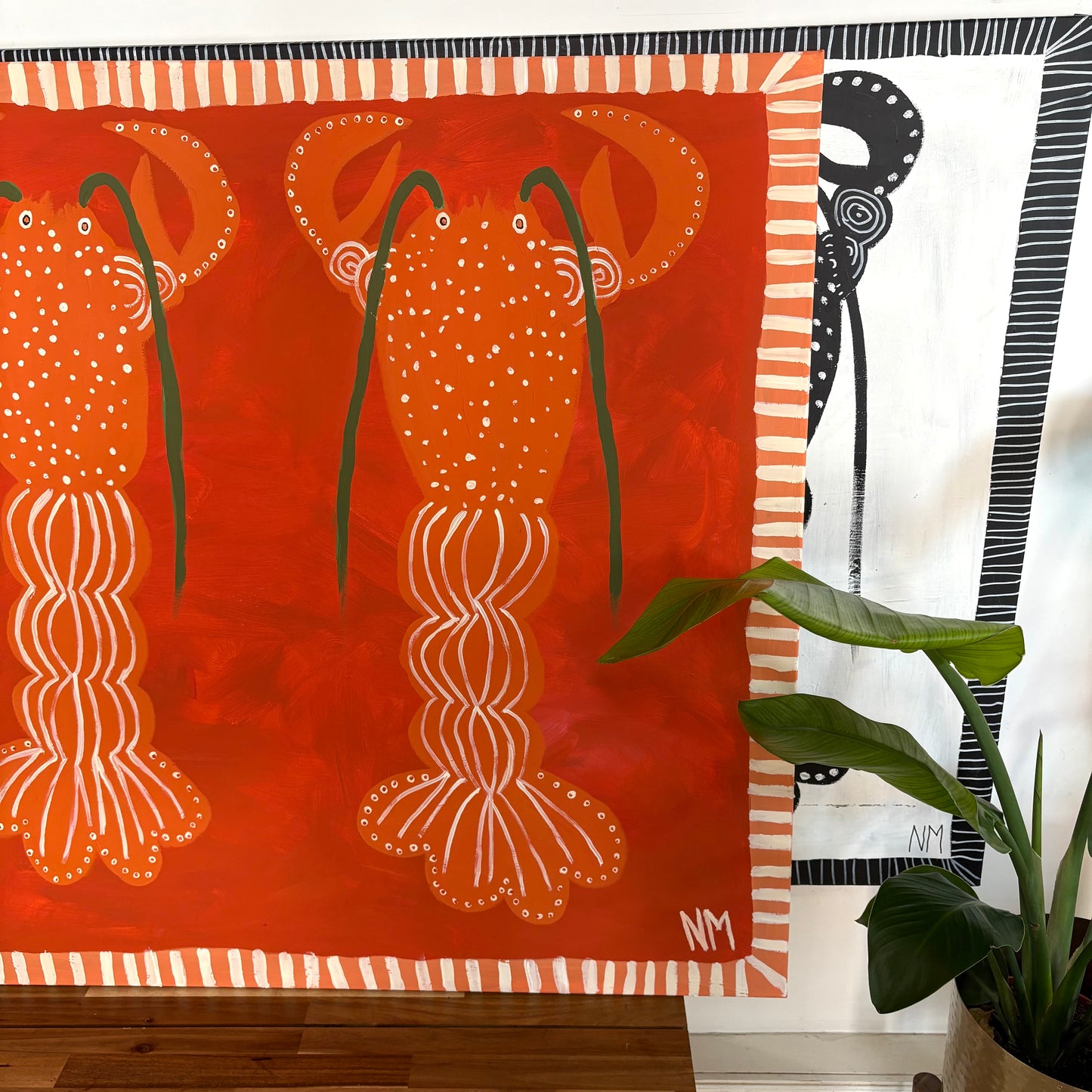 Three orange lobsters.