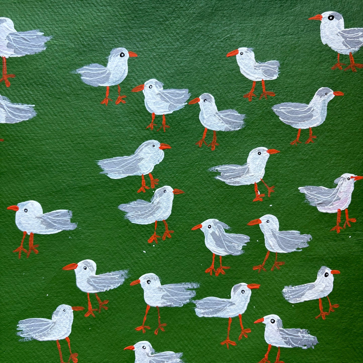 Seagulls on green.