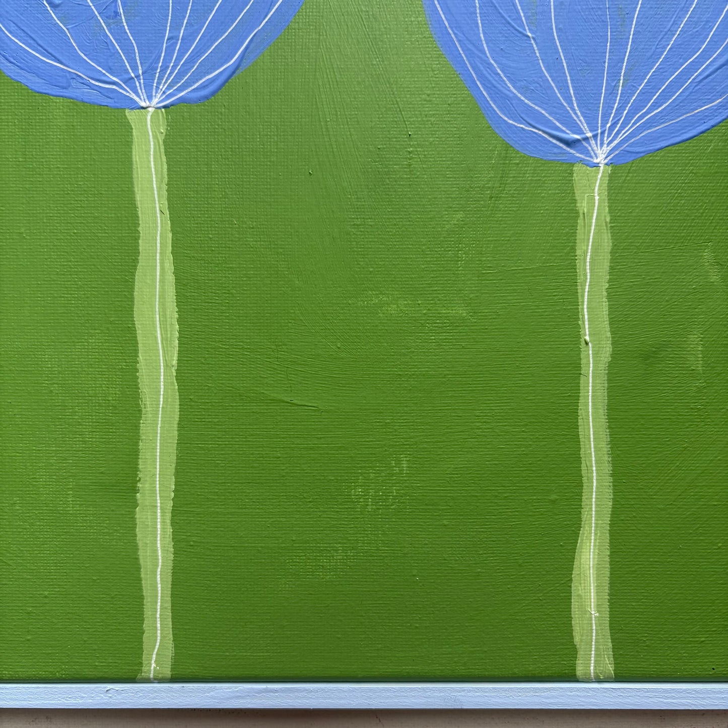 Two blue flowers.