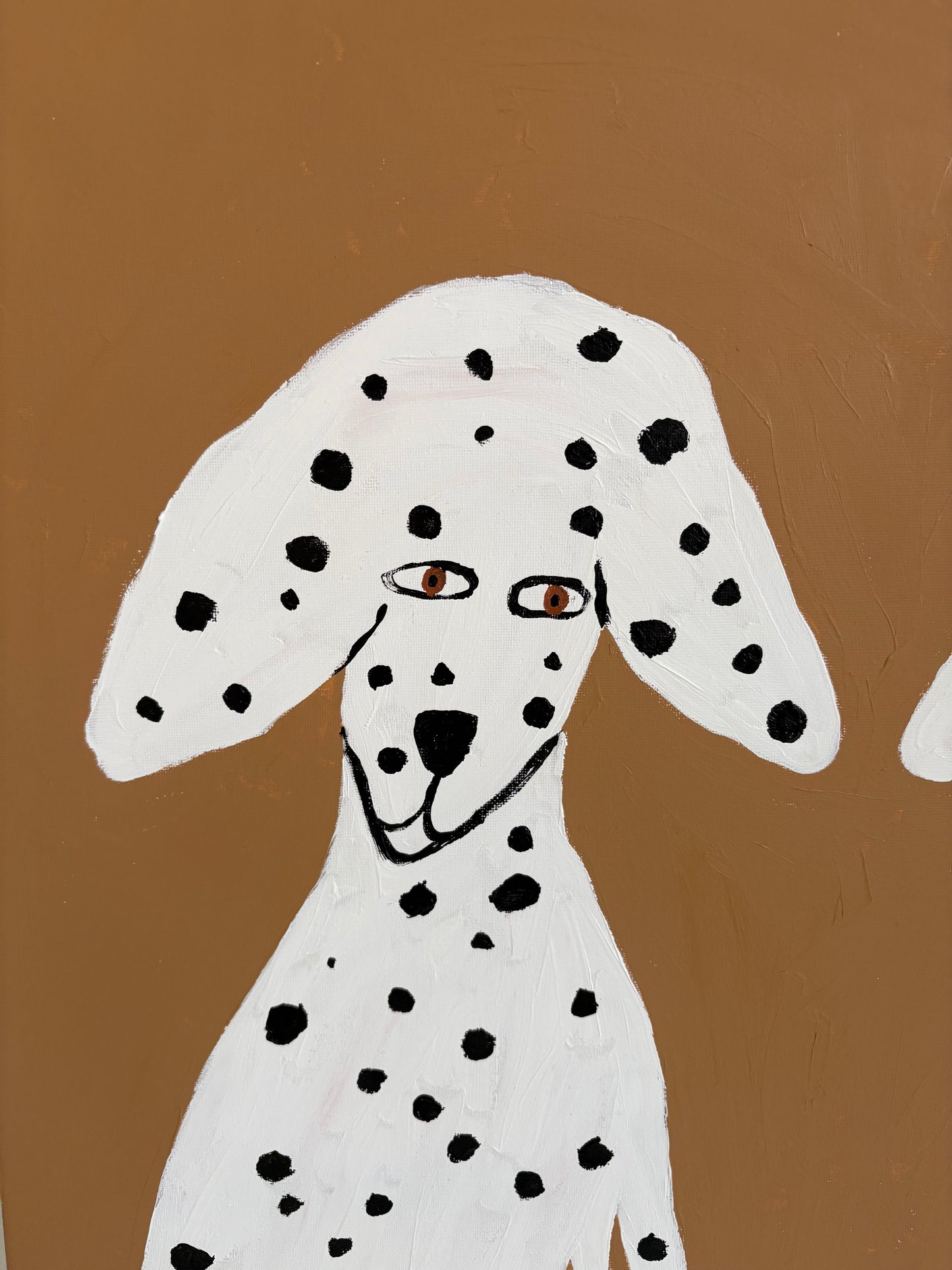 Sitting Dalmatians.