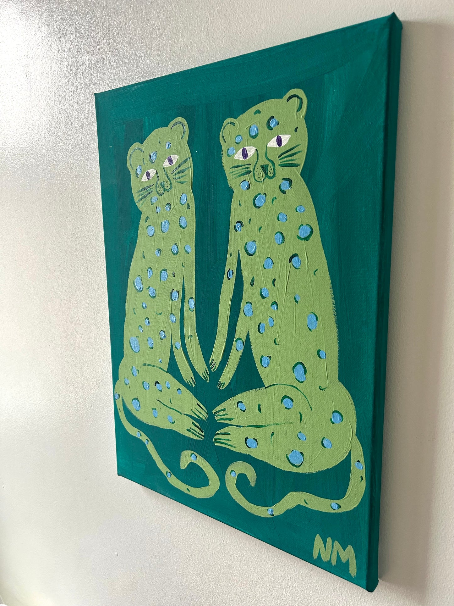 Leopard friends in green