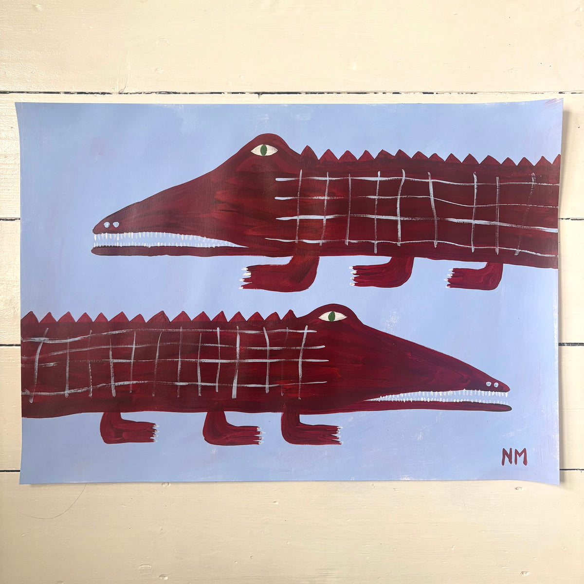Two red crocodiles.