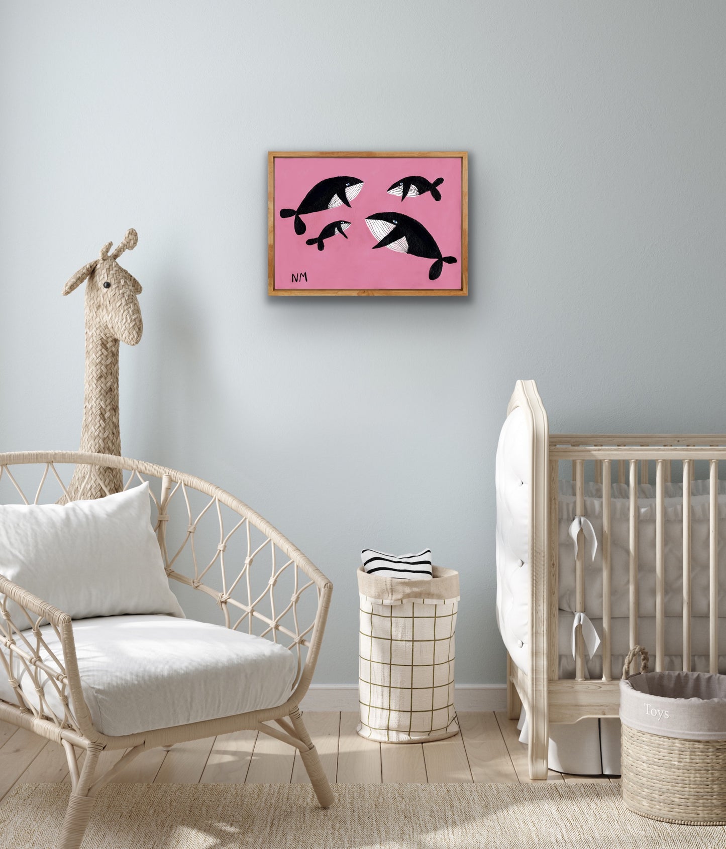 Whale family on pink print.