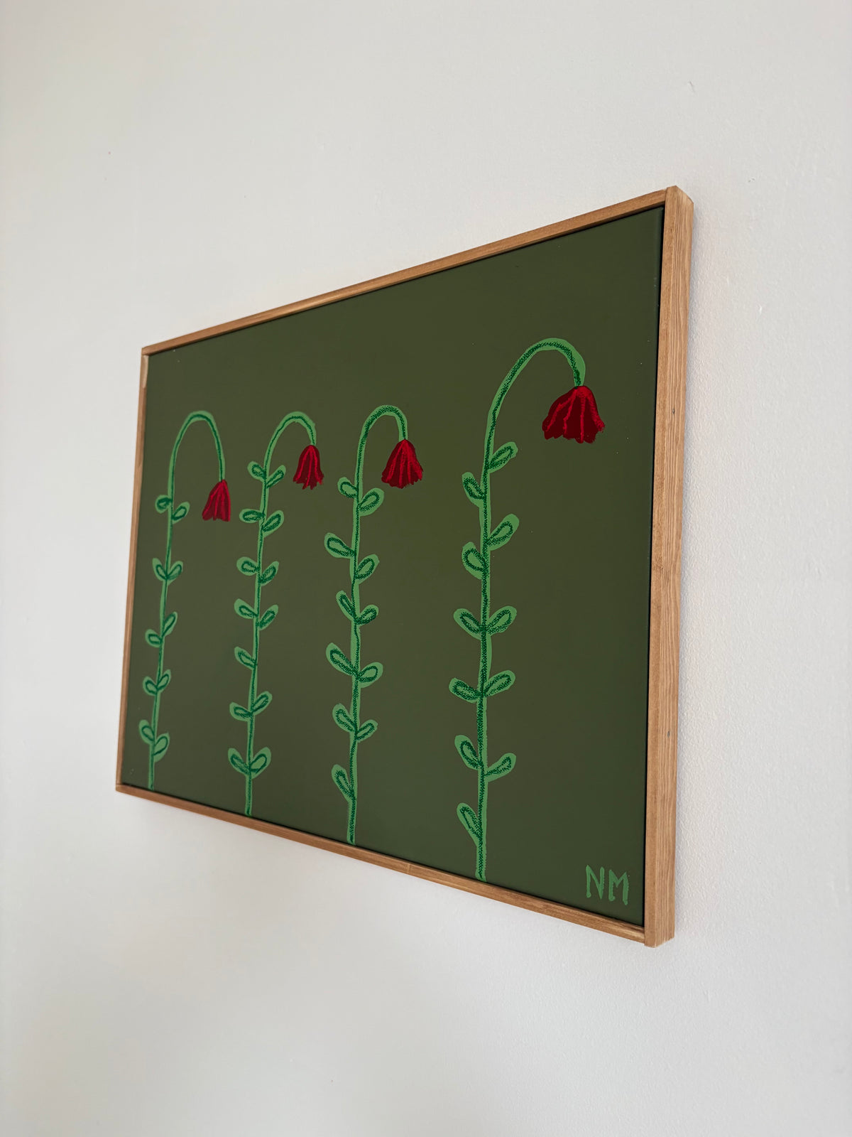 Four little red flowers.