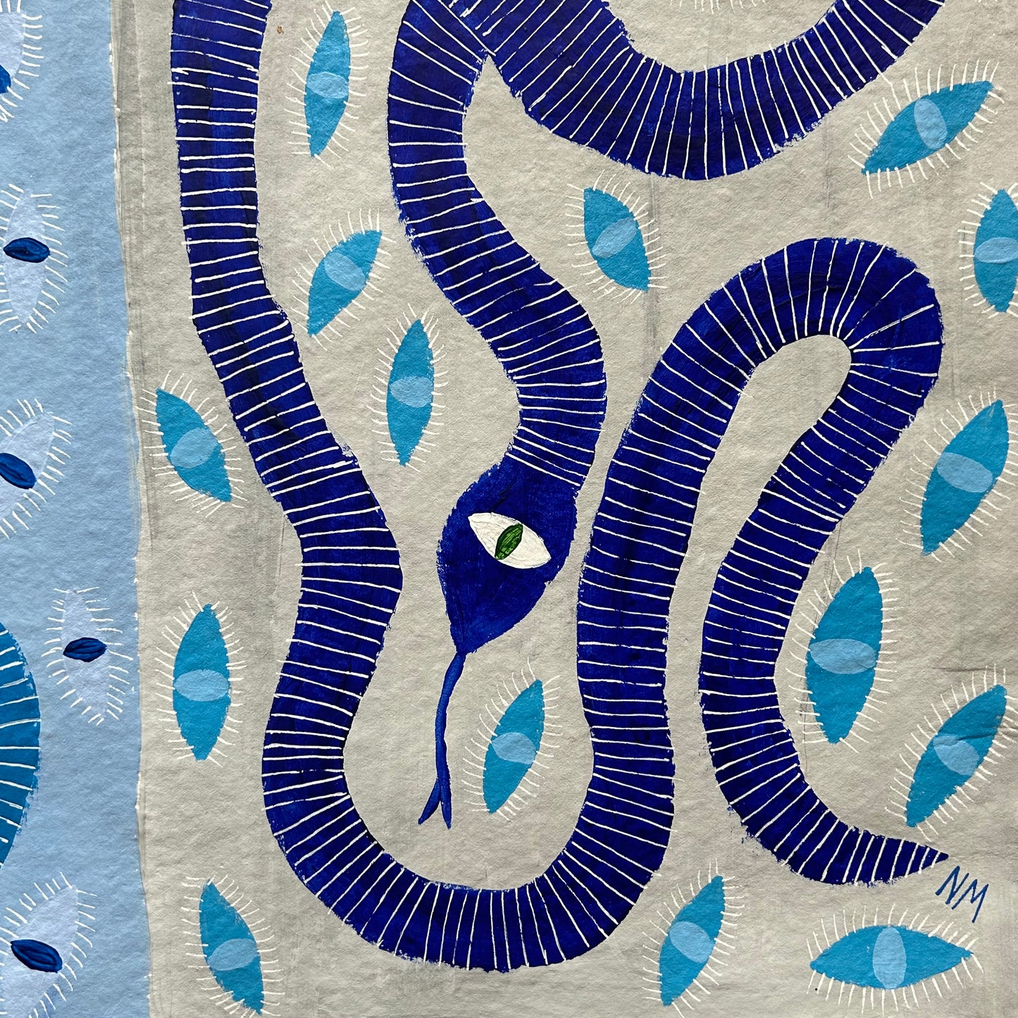 Two blue snakes with eyes