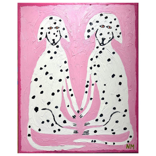 Dalmatians sitting together.