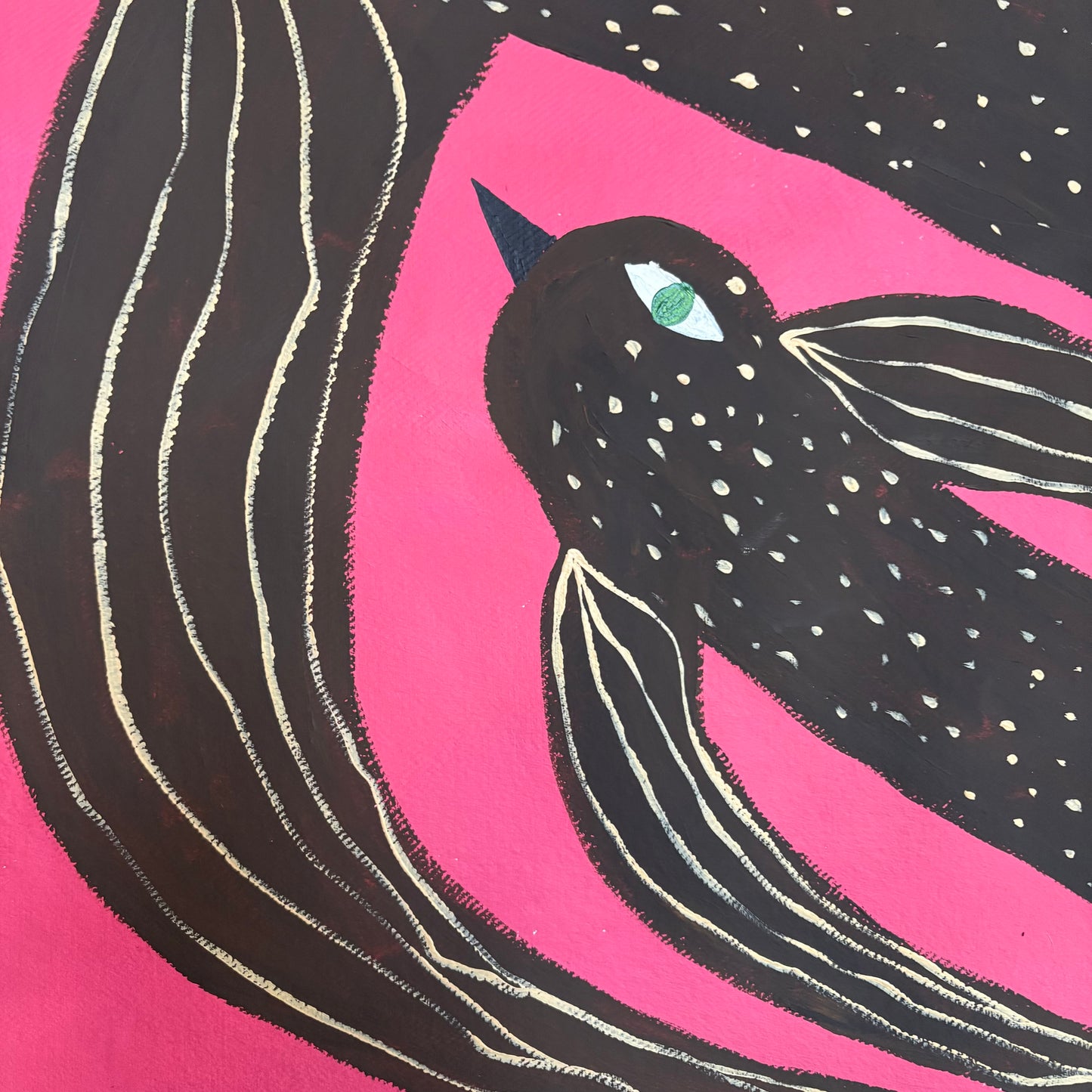 Birds flying in the pink sky.