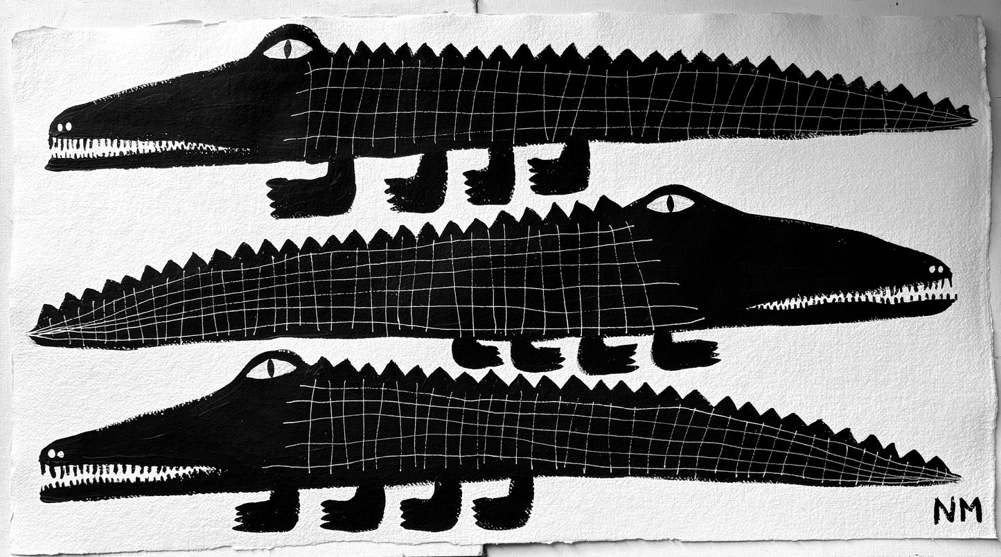 Three black crocodiles.