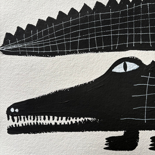 Three black crocodiles.