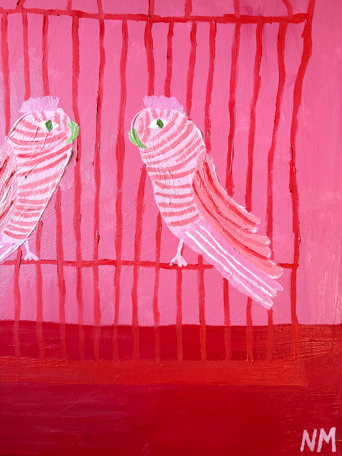 Two pink birds.