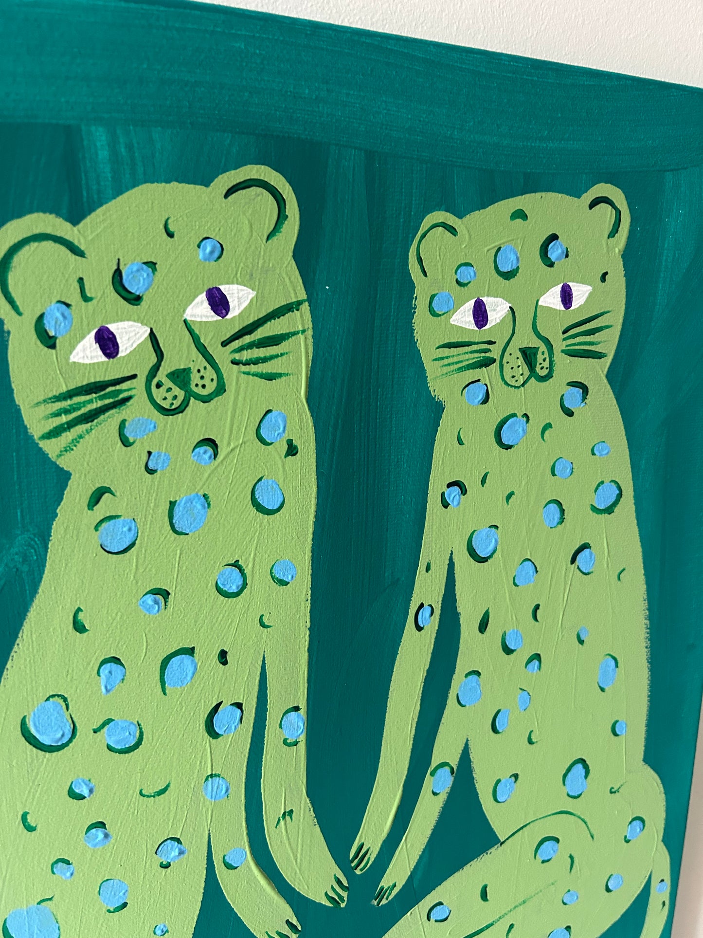 Leopard friends in green