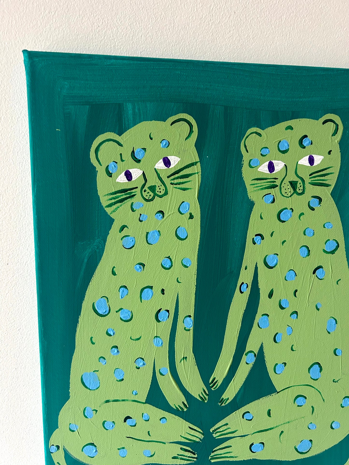 Leopard friends in green