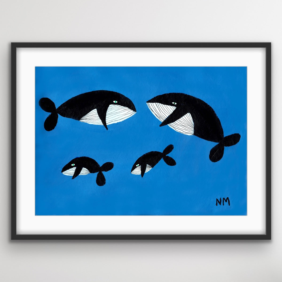 Whale family on blue print.