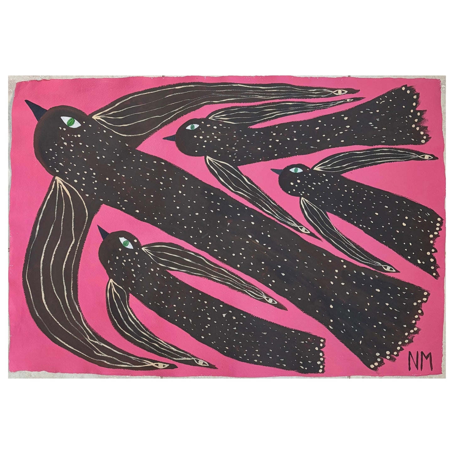 Birds flying in the pink sky.