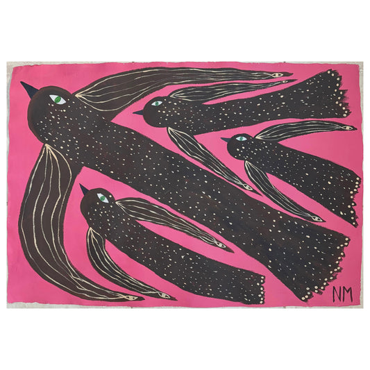 Birds flying in the pink sky.