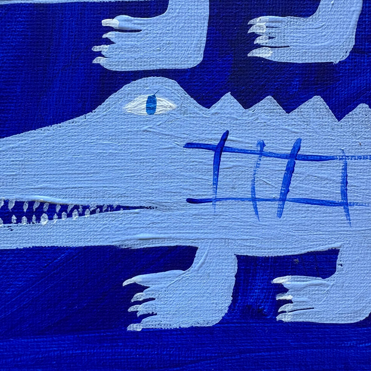 Three blue crocodiles.