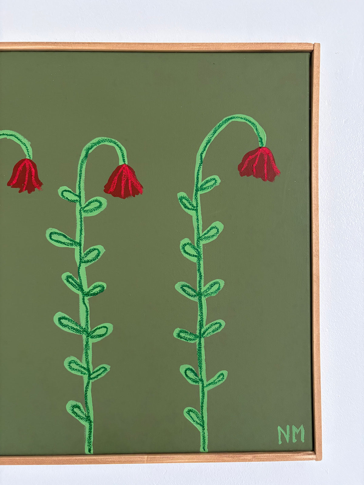 Four little red flowers.