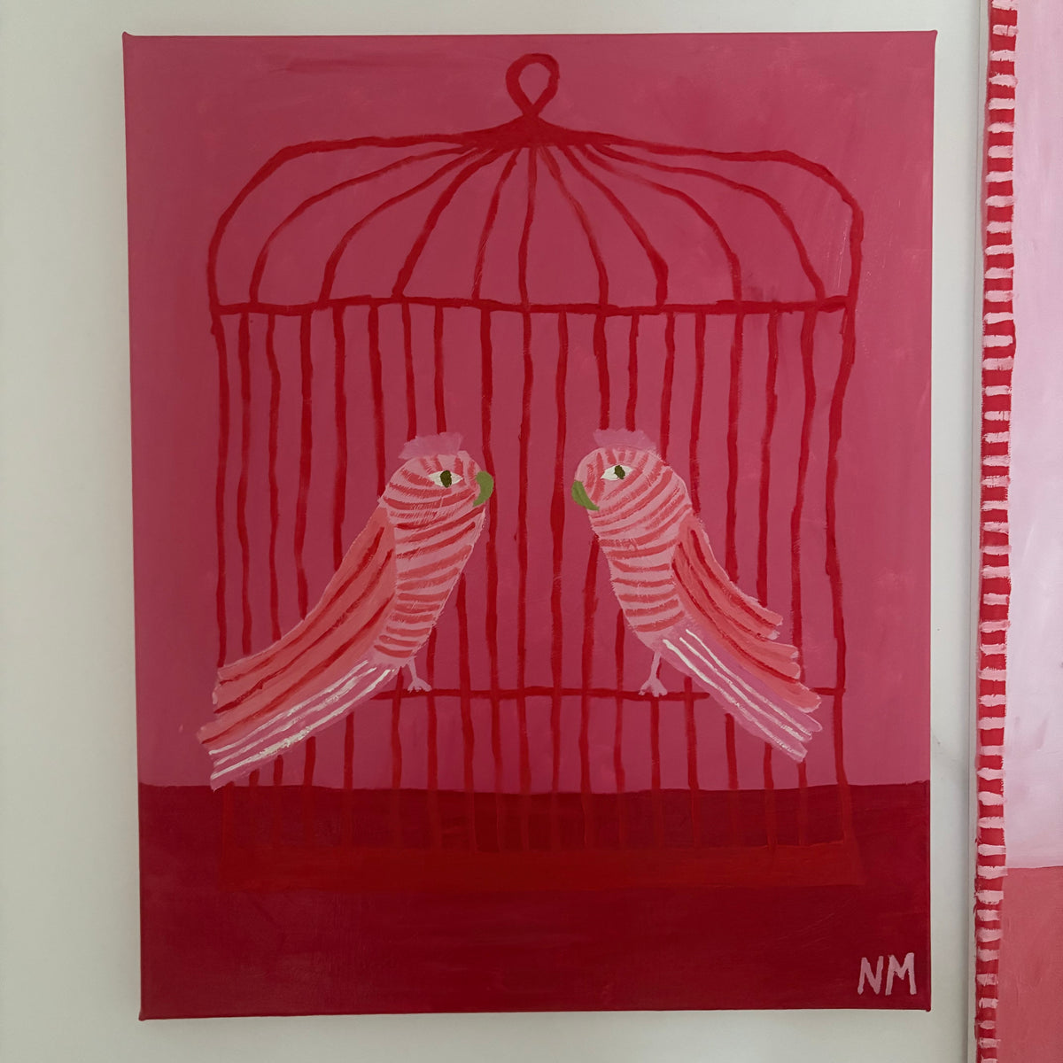 Two pink birds.