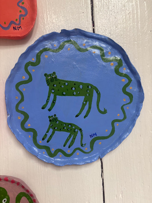 Two green leopards wall plate.