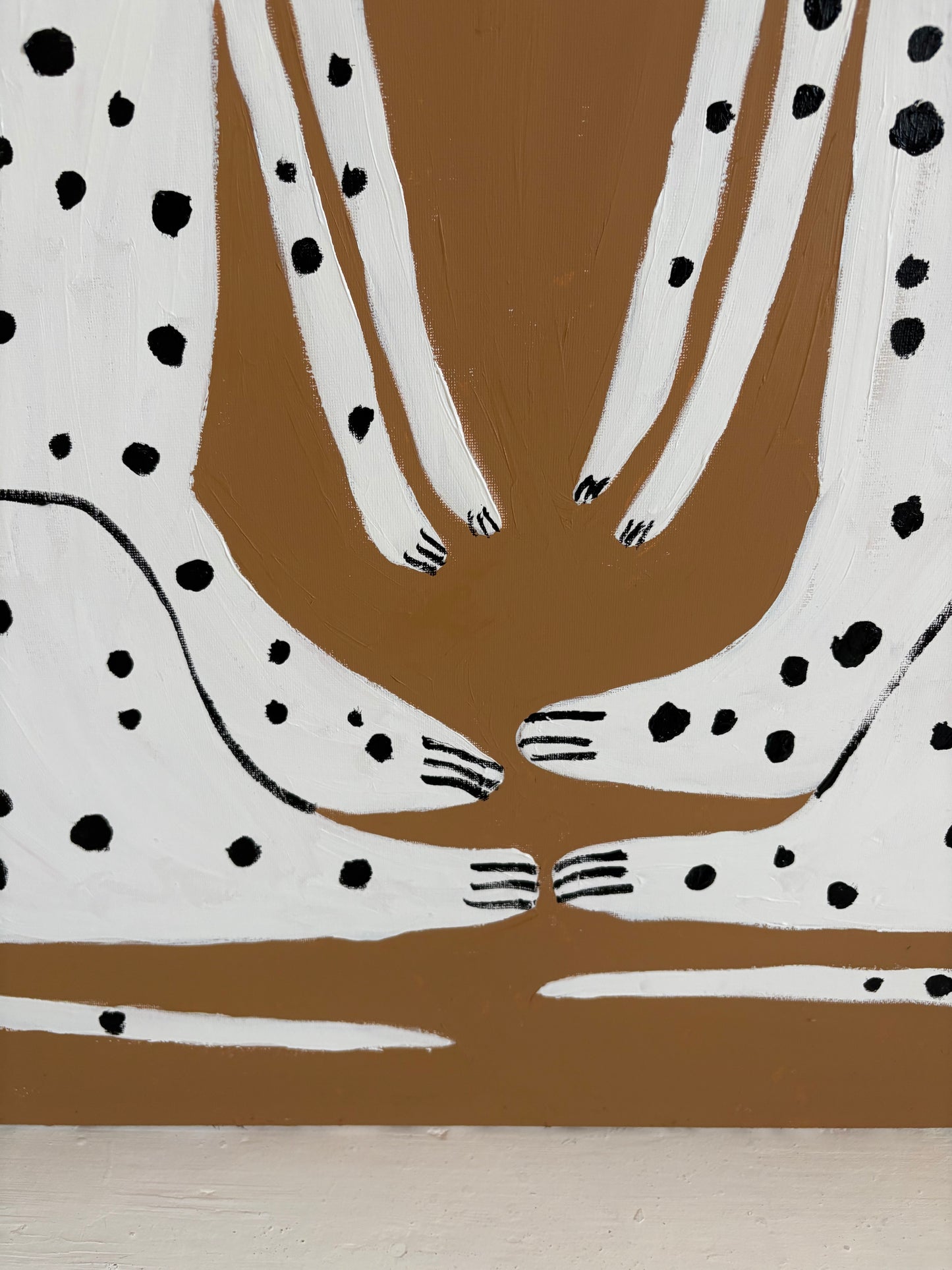 Sitting Dalmatians.