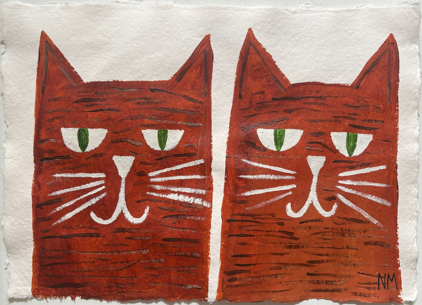 Two ginger tabby cats.