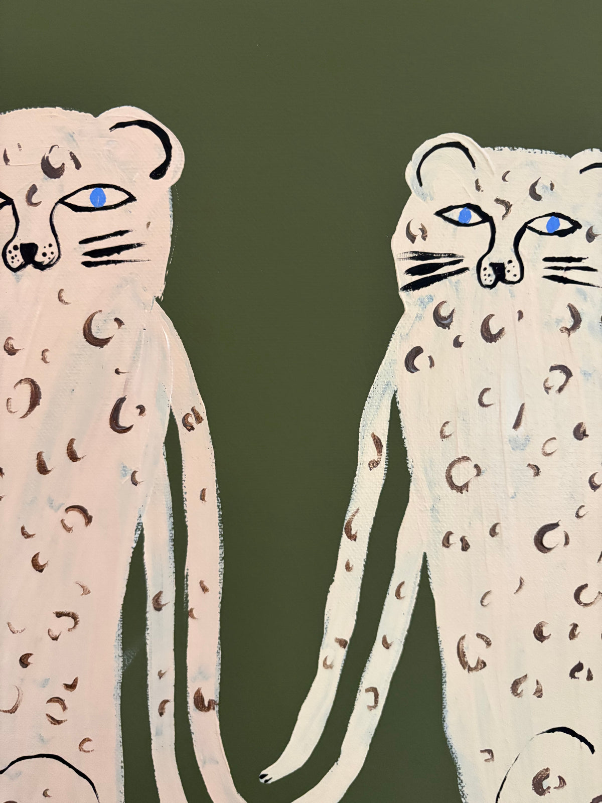Blue eyed leopards.