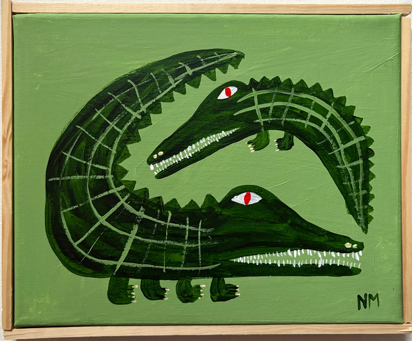 Crocodiles on green