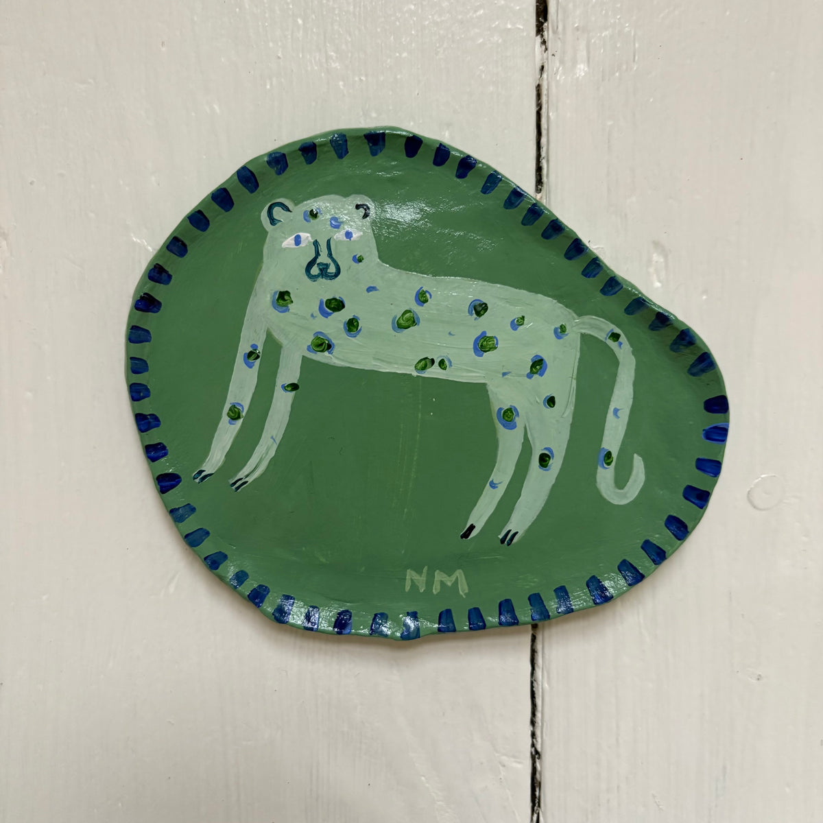 Leopard wall hanging.