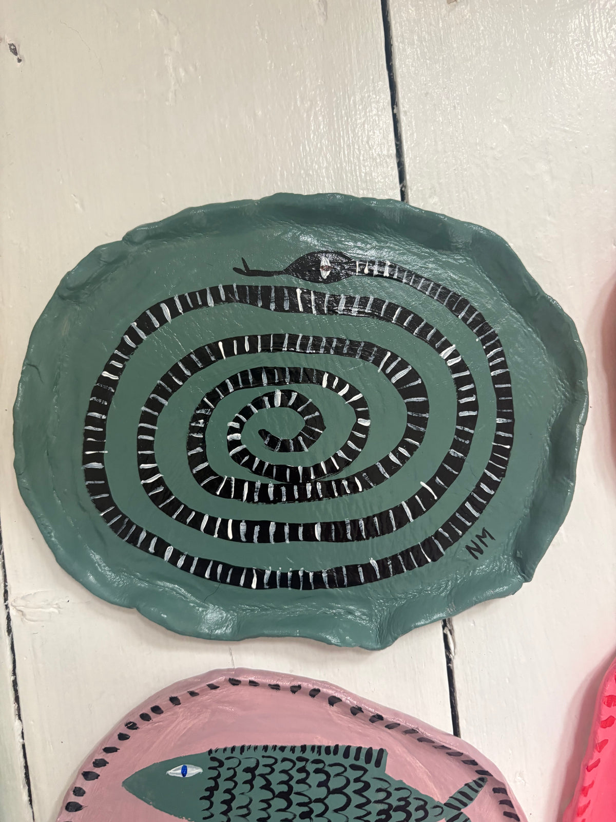 Snake wall plate.